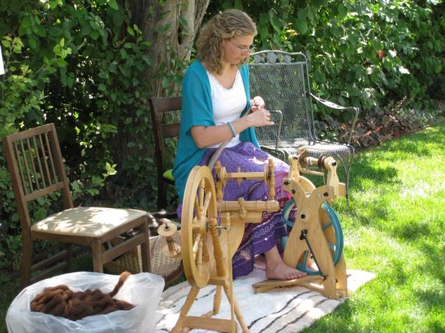 Kirstin spinning at the artist show