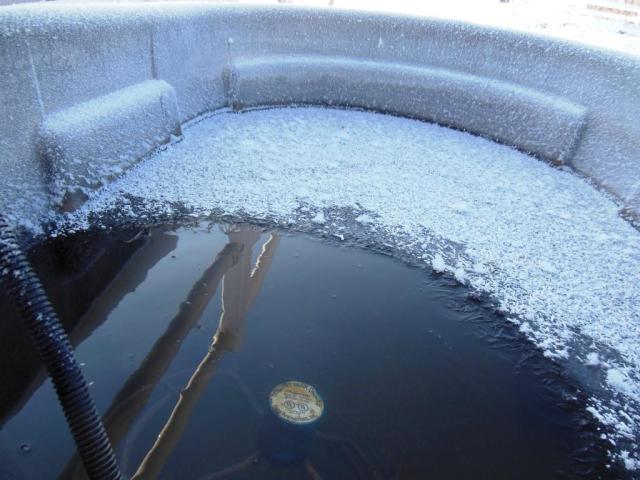 The heater in the stock tank "Trying" to stay ahead of the cold.